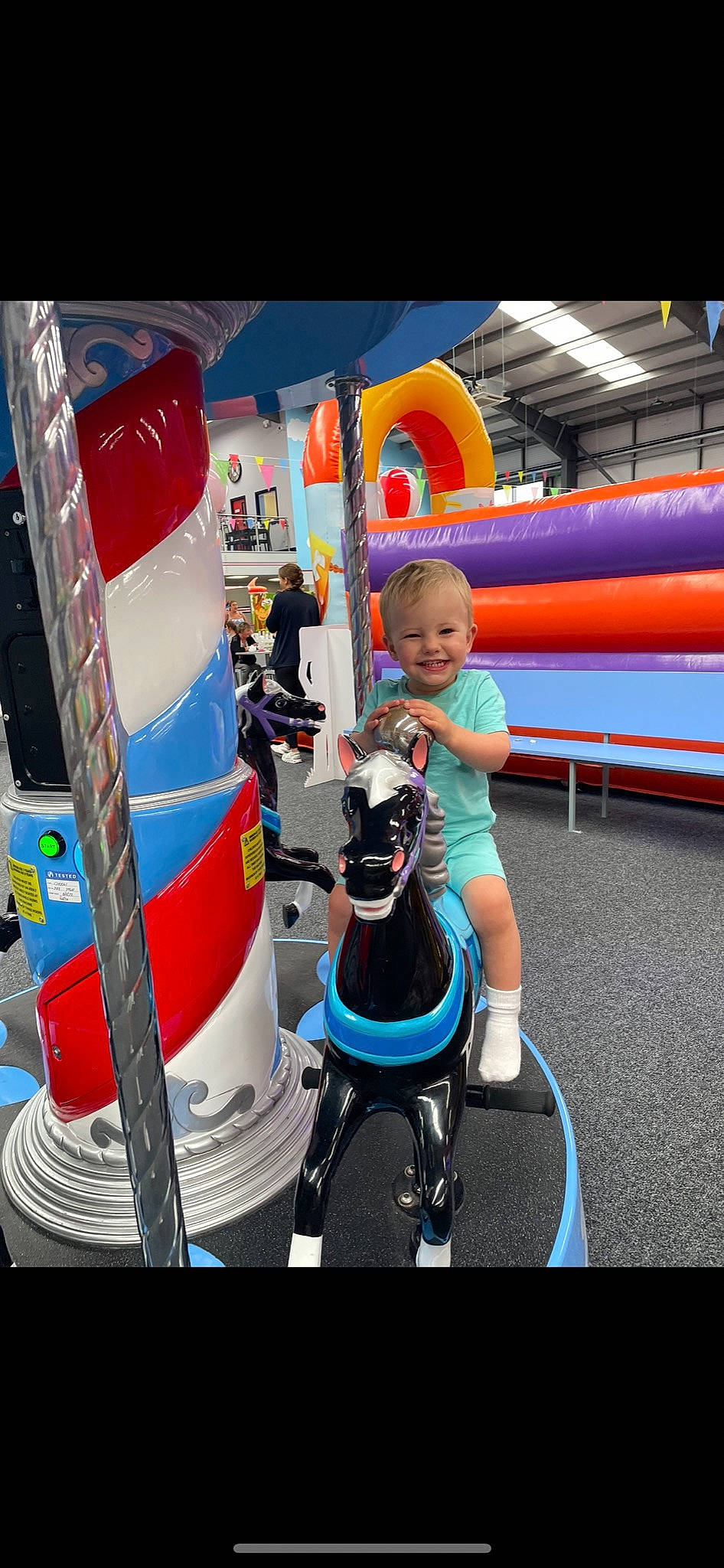 Kaysen joined the competition — help win amazing prizes! amusement_park, amusement_ride, child, chute, city, event, fictional_character, fun, inflatable, joy, leisure, machine, nonbuilding_structure, outdoor_play_equipment, person, play, playground, recreation, shorts, smile