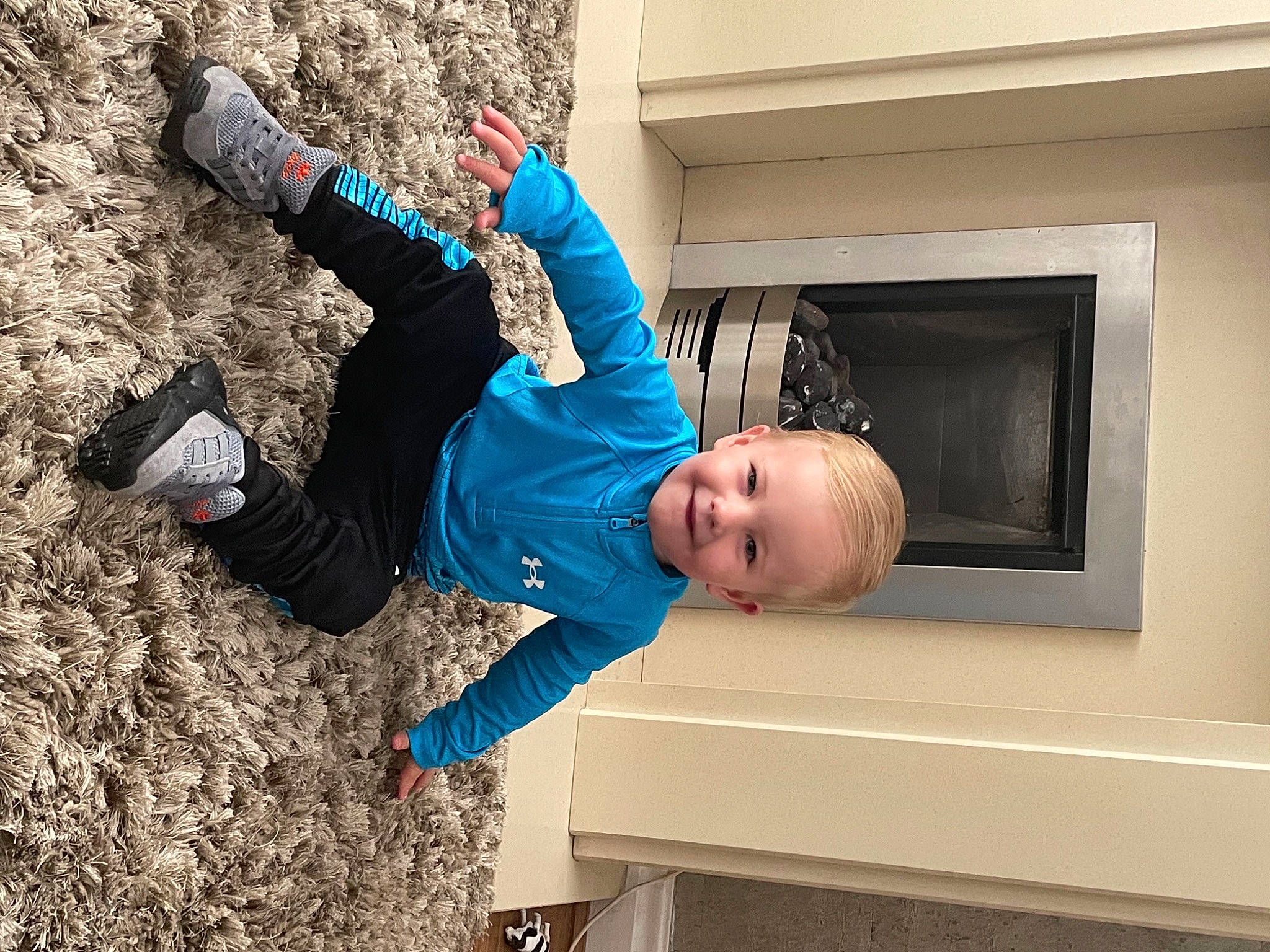 Kaysen joined the competition — help win amazing prizes! baby, baby_toddler_clothing, child, electric_blue, fun, happy, joy, leisure, person, recreation, smile, sneakers, soil, t_shirt, toddler, tree, walking_shoe, window, wood