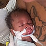 Teangelo is registered to the contest to win money with this photo: arm, baby, blanket, care, closeup, cute, healthcare, indoors, infant, love, medical_tubes, newborn, peaceful, person, quiet, resting, skin, sleeping, soft, tattoo