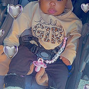 Faith joined the competition — help win amazing prizes! baby, infant, child, stroller, portrait, sitting, wide_eyed, bow, pacifier, baby_clothing, sweatshirt, boots, heart_filter, digital_filter, car_seat, harness, beads, outdoor, photography, cute