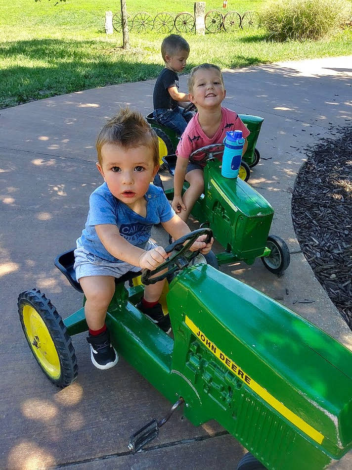 Caleb joined the competition — help win amazing prizes! asphalt, automotive_tire, baby_toddler_clothing, child, fun, grass, green, joy, leisure, mode_of_transport, motor_vehicle, person, photograph, plant, play, recreation, riding_toy, shorts, tire, toddler