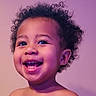 child, toddler, smiling, curly_hair, portrait, happy, face, bare_shoulders, cute, innocence, young_child, glowing_skin, blue_eyes, head_and_shoulders, studio_lighting, purple_background, joyful, expressive, close_up, human