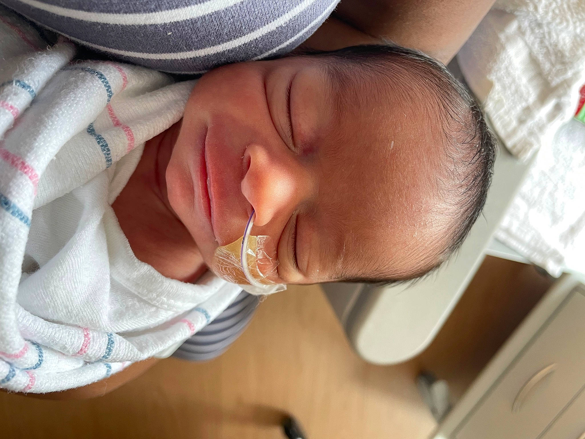 Cairo is registered to the contest to win money with this photo: baby, baby_toddler_clothing, cheek, child, chin, comfort, ear, eyebrow, eyelash, head, lip, mouth, nail, neck, nose, person, skin, sleeve, sun_hat, thumb