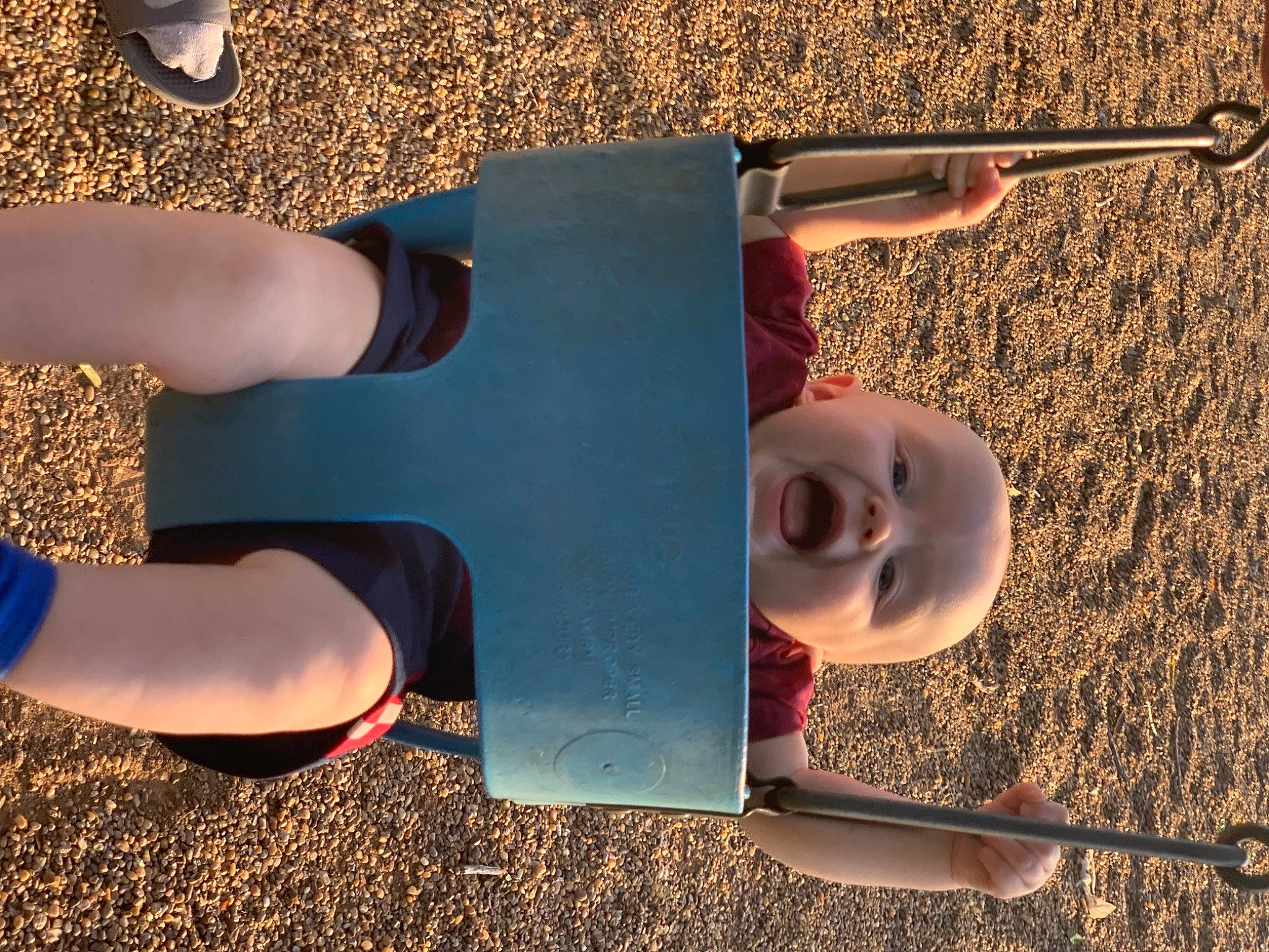 Kolby is registered to the contest to win money with this photo: blue, facial_expression, finger, fun, gesture, grass, happy, human_body, knee, leisure, light, people_in_nature, person, shoe, smile, standing, summer, thigh, tints_and_shades, toddler