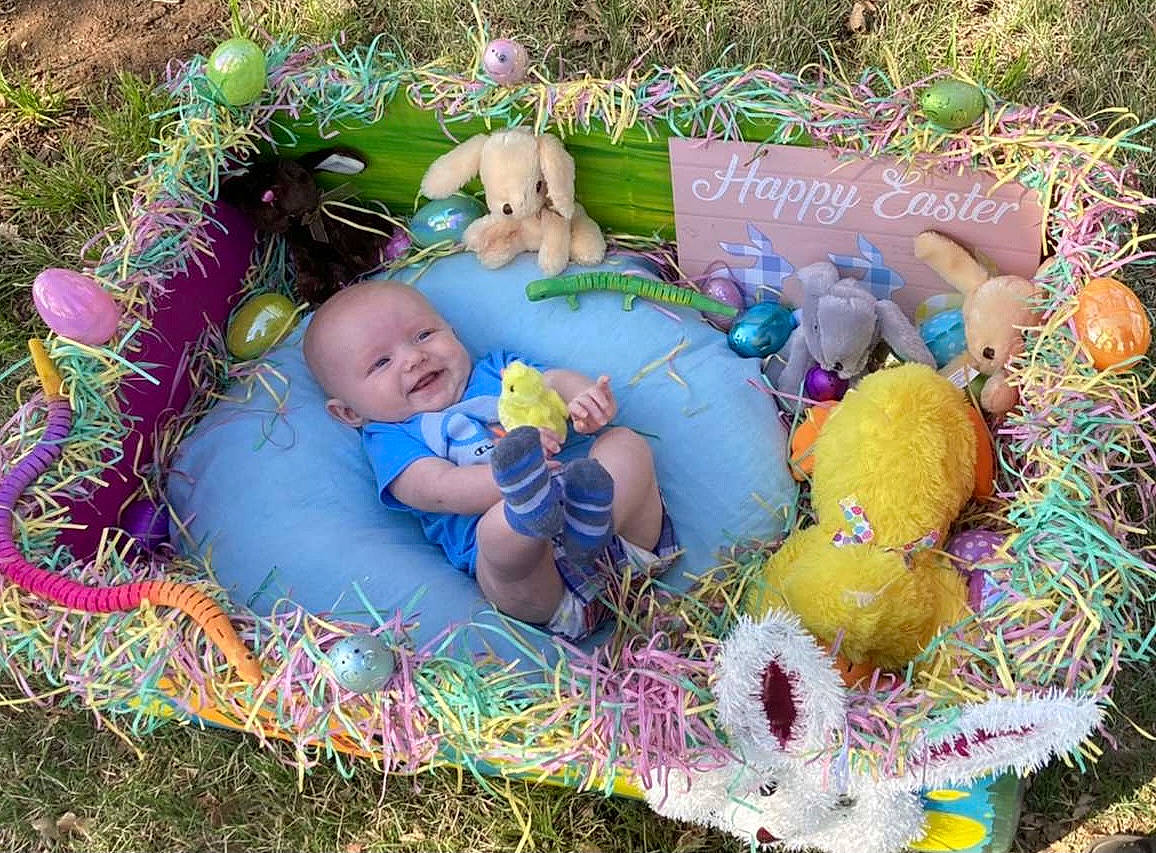 Kolby joined the competition — help win amazing prizes! baby, baby_toys, child, easter, event, grass, happy, person, plant, stuffed_toy, toddler, toy, tree