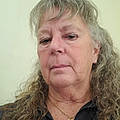 Debra E.