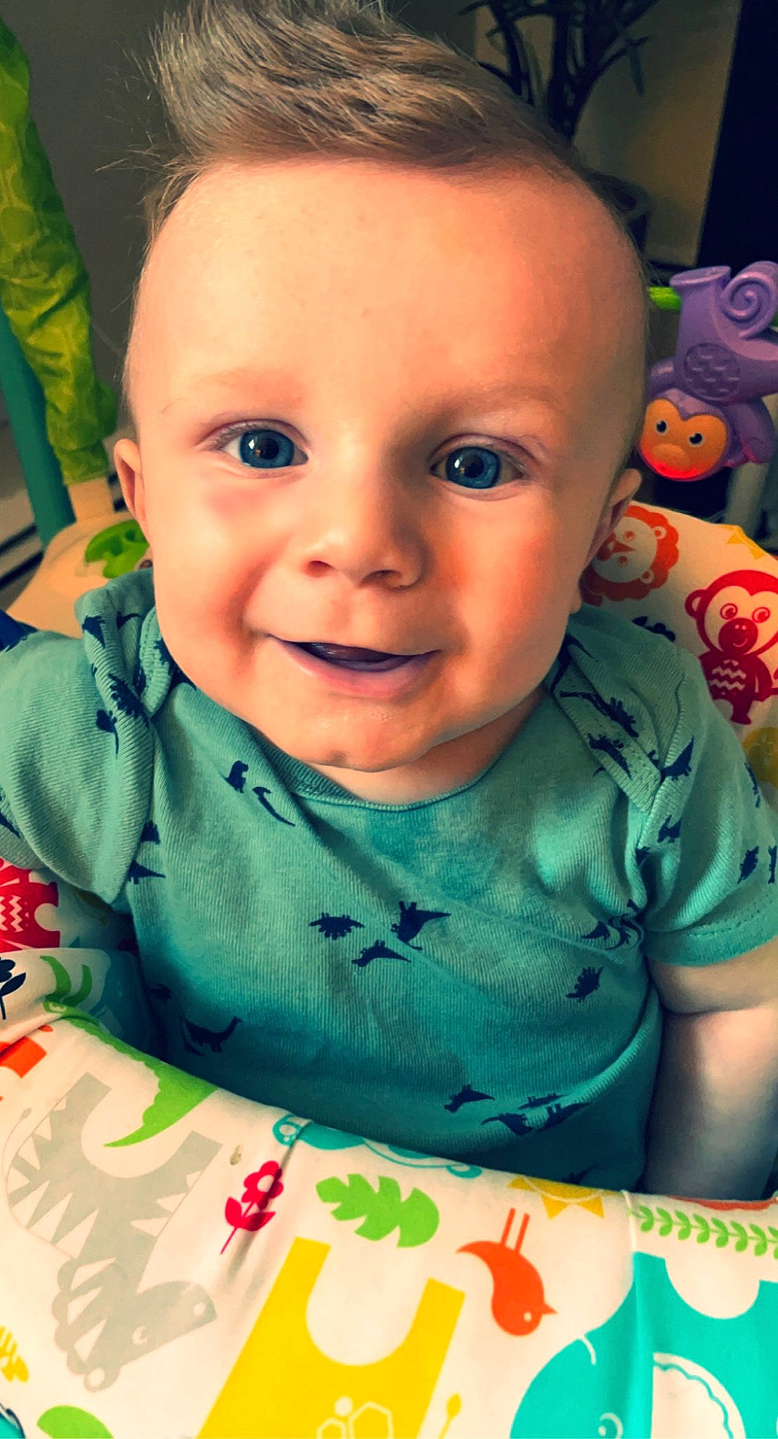 Colin is registered to the contest to win money with this photo: baby, baby_toddler_clothing, cheek, chin, eyebrow, eyelash, forehead, green, hairstyle, happy, iris, lip, mouth, nose, person, product, skin, sleeve, smile, toddler