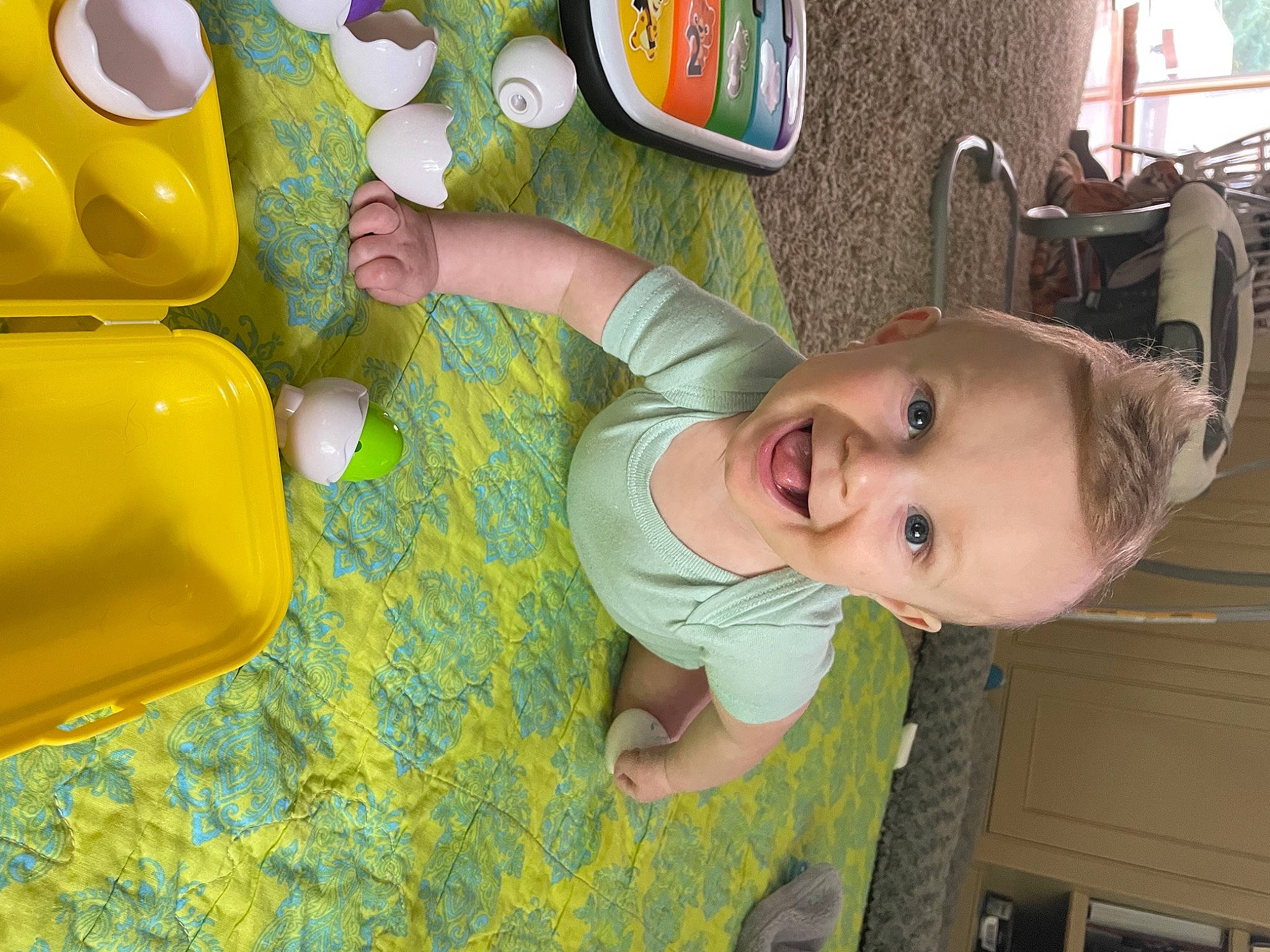 Colin joined the competition — help win amazing prizes! baby, baby_products, baby_toddler_clothing, child, fun, green, happy, hat, leisure, nose, person, play, product, room, smile, snapshot, tableware, toddler, toy, wood