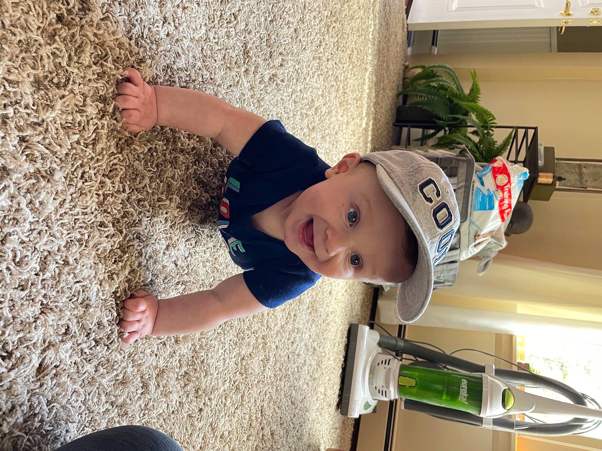 Colin joined the competition — help win amazing prizes! baby, cap, car, child, flowerpot, fun, grass, hat, headwear, houseplant, leisure, person, plant, soil, t_shirt, tire, toddler, tree, vacation, vehicle_door