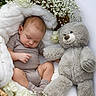 Jackson is registered to the contest to win money with this photo: baby, sleeping, basket, blanket, flowers, teddy_bear, soft, cozy, cute, infant, child, rest, peaceful, plush, white, nature, portrait, newborn, cuddle, comfort