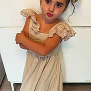Kataleïa a rejoint le concours — aidez-le/la à gagner de superbes lots ! child, girl, dress, hair_bows, arms_crossed, pout, white_shoes, lace, standing, floor, indoors, playful, young, cute, brown_hair, fashion, portrait, person, expression, tile_floor