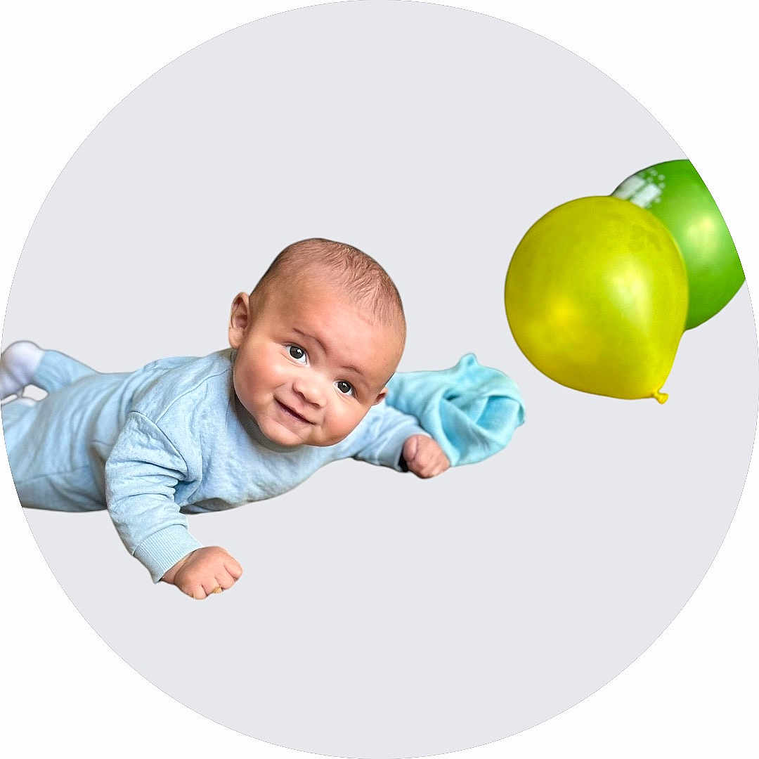 Archie is registered to the contest to win money with this photo: accessories, baby, balloon, bodypart, clothing, crawling, face, finger, formalwear, hand, hat, head, newborn, people, person, photography, portrait, sphere, tie