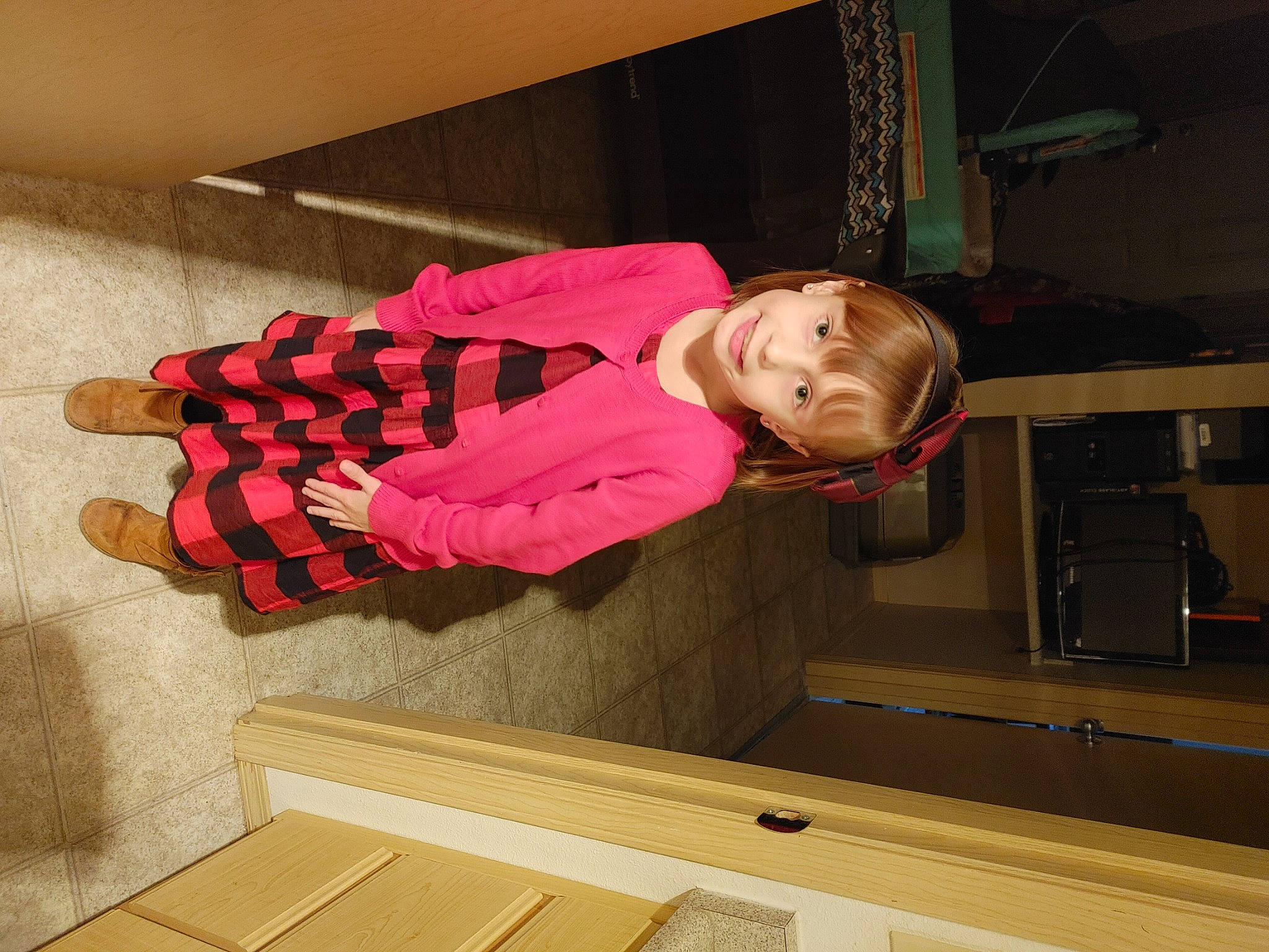 Addisyn is registered to the contest to win money with this photo: baby_toddler_clothing, carmine, child, comfort, flooring, fun, hardwood, hat, helmet, human_leg, jacket, joy, magenta, pattern, person, room, sock, thigh, toddler, tree