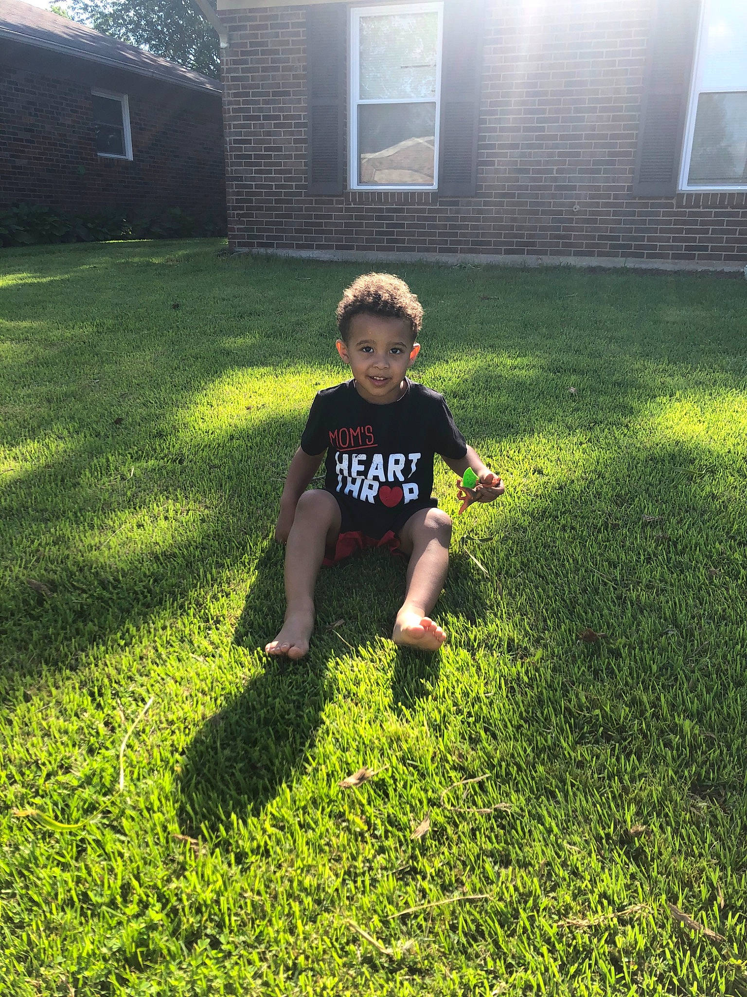 Kaynan joined the competition — help win amazing prizes! artificial_turf, backyard, child, garden, grass, grass_family, home, house, joy, lawn, mountain, person, plant, play, summer, sunlight, toddler, yard