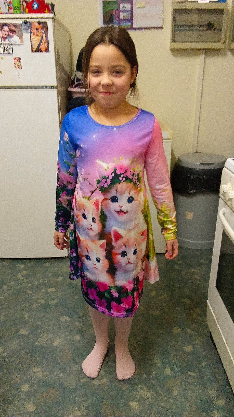 Louana participe au concours pour gagner de l'argent avec cette photo : child, fashion_design, fawn, floor, flooring, fun, hair, home_appliance, joint, joy, magenta, one_piece_garment, pattern, person, picture_frame, pink, refrigerator, shoulder, sleeve, smile