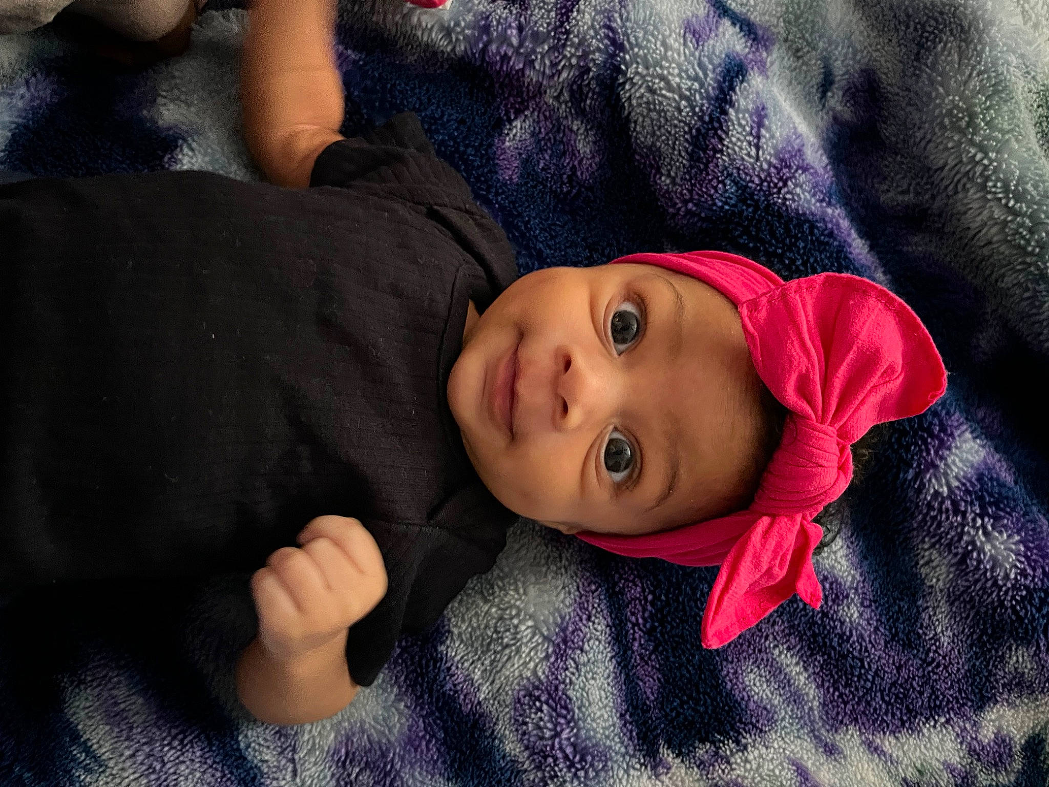 Armani is registered to the contest to win money with this photo: baby, baby_toddler_clothing, cheek, child, comfort, electric_blue, eye, fun, hat, headwear, iris, linens, lip, magenta, nose, person, polar_fleece, portrait_photography, skin, sleeve