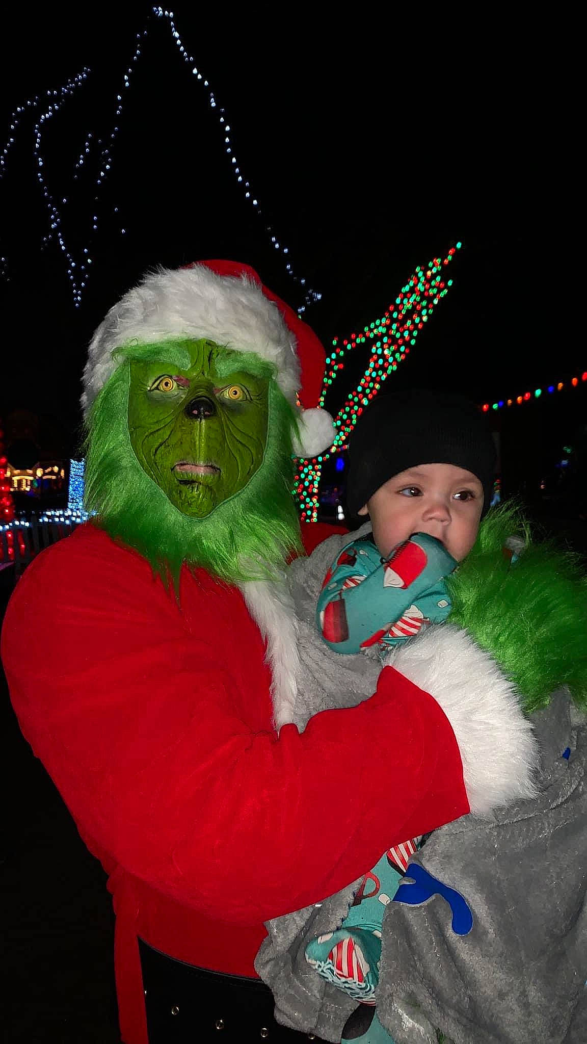 Trey joined the competition — help win amazing prizes! beard, celebrating, christmas, christmas_decoration, christmas_eve, christmas_lights, costume_hat, event, facial_expression, facial_hair, fictional_character, fun, fur, happy, hat, headwear, holiday, interior_design, lap, person