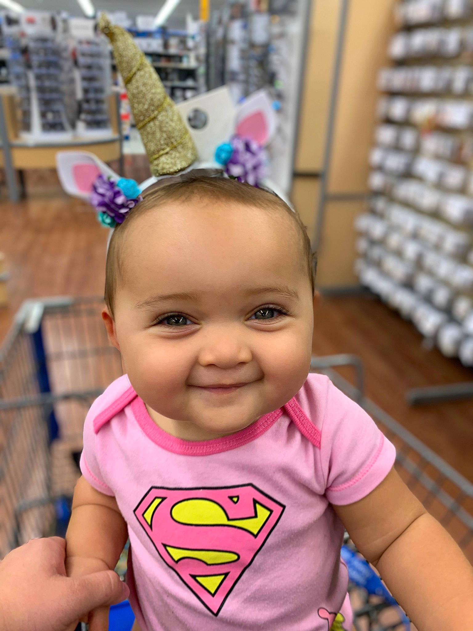 Amariana is registered to the contest to win money with this photo: baby, child, ear, fashion_accessory, fun, hair_accessory, happy, head, headband, headgear, joy, person, pink, smile, toddler