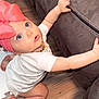 Everleigh is registered to the contest to win money with this photo: baby, child, indoor, couch, floor, wooden_floor, pink_bow, headband, white_onesie, crawling, curious, blue_eyes, necklace, hand, foot, furniture, living_room, person, cute, infant