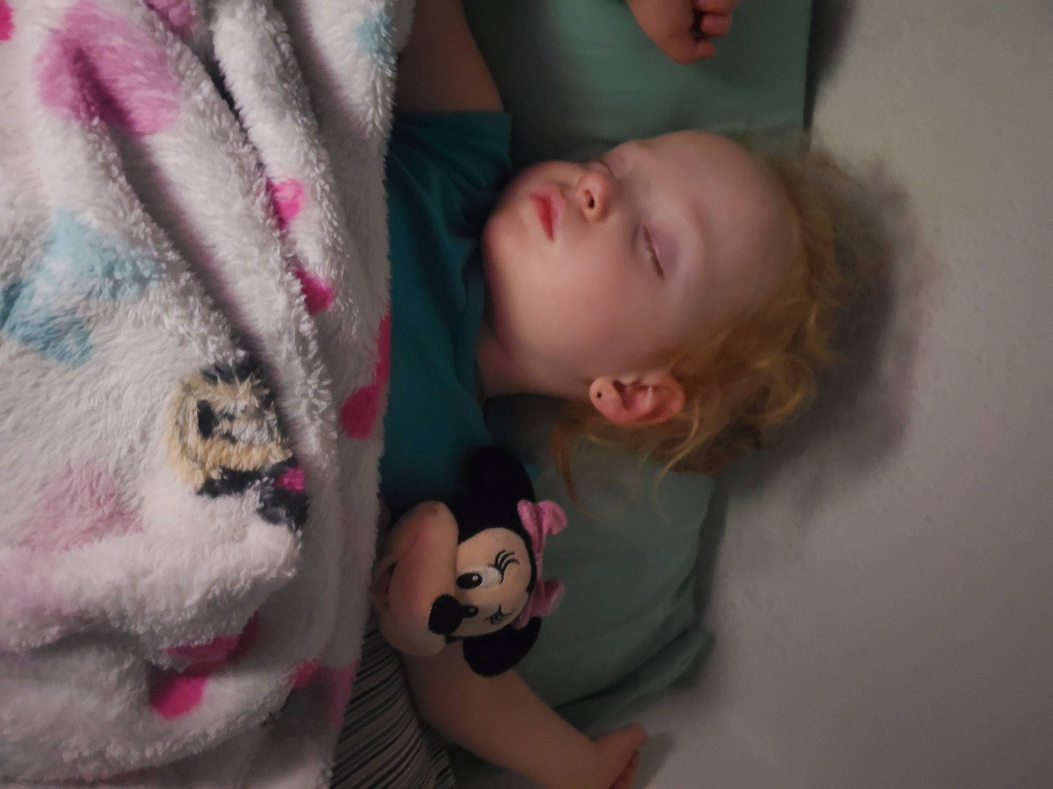 Amber is registered to the contest to win money with this photo: baby, baby_toddler_clothing, cheek, child, comfort, eyelash, facial_expression, flooring, fun, hair, happy, head, mouth, neck, nose, person, pink, skin, textile, toddler