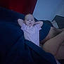 Willow joined the competition — help win amazing prizes! child, baby, blanket, blue_blanket, pink_shirt, relaxing, indoor, person, legs, couch, resting, casual, comfort, home, young_child, portrait, hands_behind_head, dim_lighting, curtain, cozy