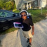 Rylynn joined the competition — help win amazing prizes! accessories, black_shoes, braids, car, child, daylight, driveway, girl, grass, happy, headphones, house, outdoor, sidewalk, skirt, smile, sunglasses, sunny, tablet, technology