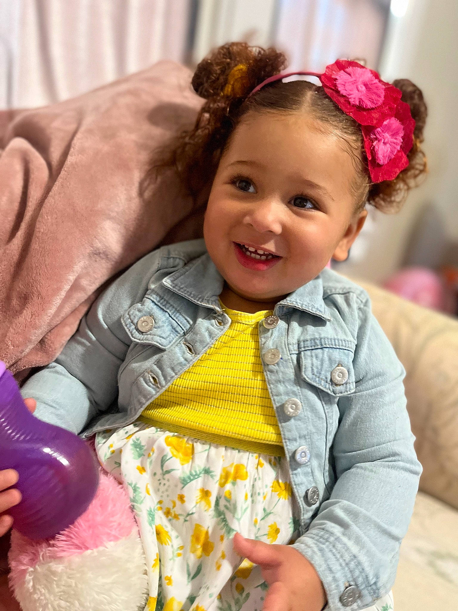 Isabella is registered to the contest to win money with this photo: baby, baby_toddler_clothing, cheek, child, clothing, dress, eye, fun, gesture, hair, happy, head, headgear, iris, joy, organ, person, pink, skin, sleeve