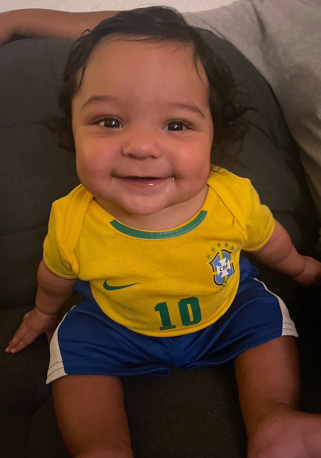 Leonardo is registered to the contest to win money with this photo: arm, baby_toddler_clothing, cheek, eye, face, hair, hairstyle, head, human_body, joint, joy, leg, mouth, muscle, neck, nose, organ, person, shoulder, skin