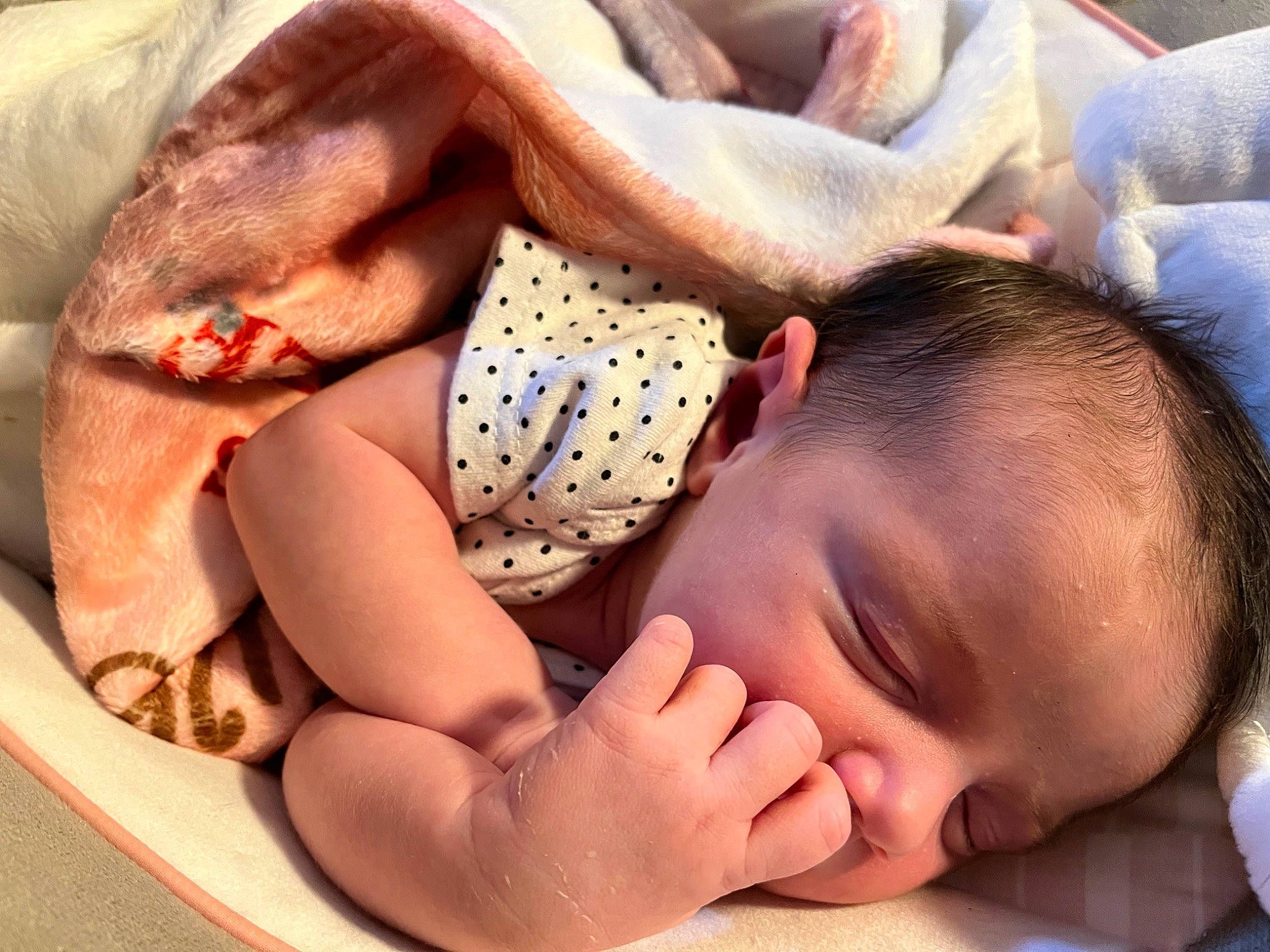 Maylah is registered to the contest to win money with this photo: baby, baby_sleeping, baby_toddler_clothing, cheek, child, close_up, comfort, eye, finger, gesture, happy, head, linens, mammal, mouth, nail, nose, person, skin, thumb