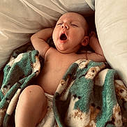 Amelie joined the competition — help win amazing prizes! animal_print, baby, bed, blanket, child, comfort, cozy, cute, diaper, indoors, infant, peaceful, pillow, portrait, relaxed, resting, skin, sleeping, soft_fabric, yawning