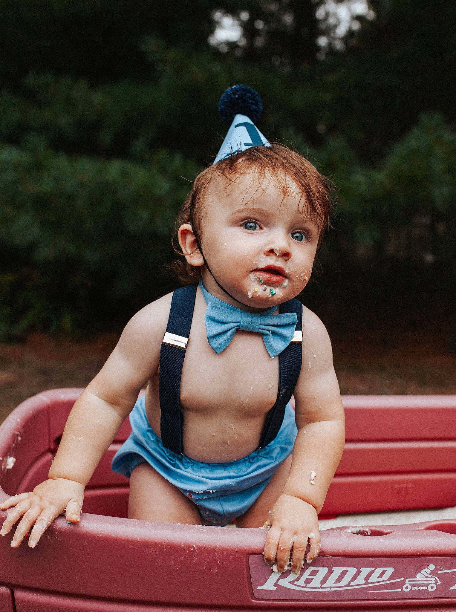 Austin is registered to the contest to win money with this photo: baby, baby_products, baby_toddler_clothing, child, electric_blue, eye, fashion_accessory, flash_photography, fun, grass, happy, jewellery, leisure, pattern, person, plant, recreation, sitting, summer, toddler