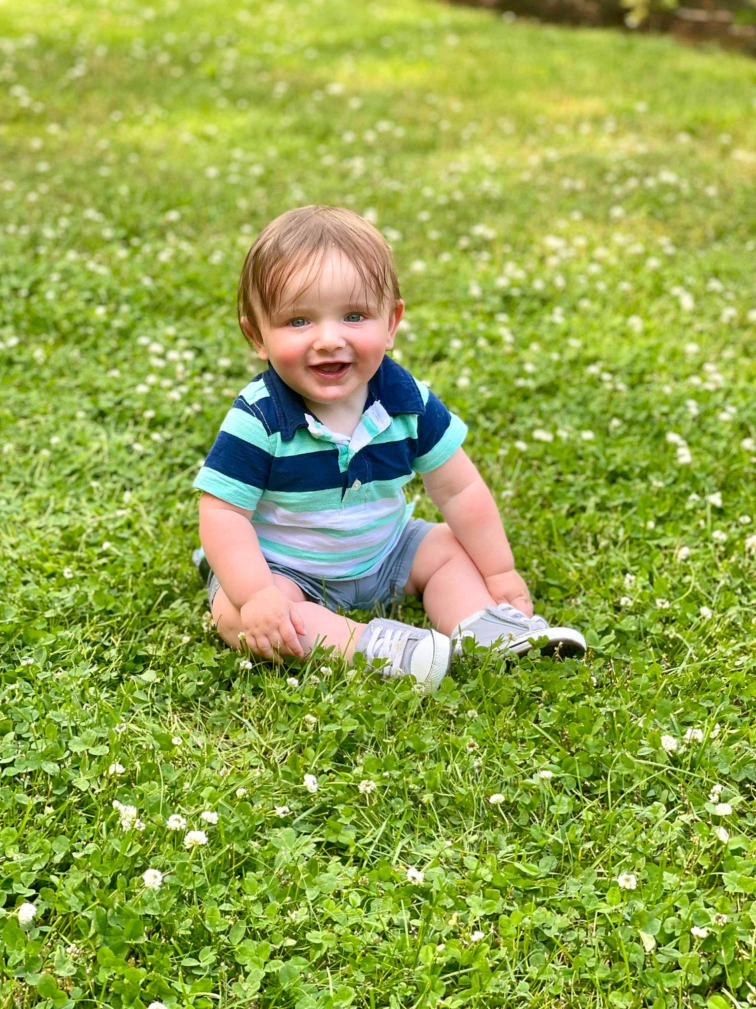 Austin is registered to the contest to win money with this photo: baby, baby_toddler_clothing, child, flower, fun, grass, grass_family, grassland, groundcover, happy, joy, landscape, lawn, meadow, natural_environment, people_in_nature, person, plant, prairie, smile