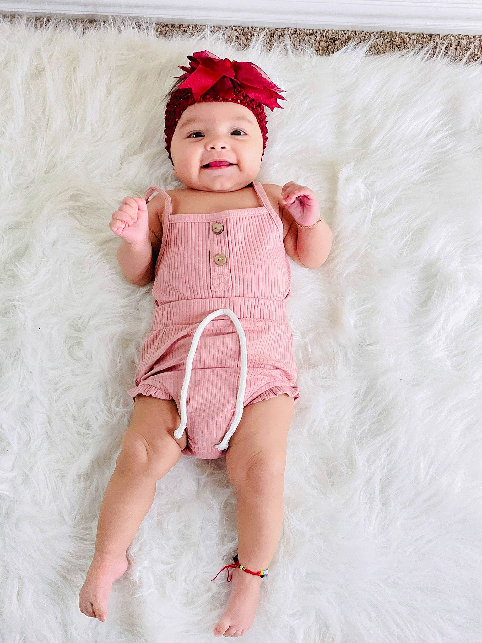 Isabella joined the competition — help win amazing prizes! baby, baby_toddler_clothing, cap, child, day_dress, dress, embellishment, fashion_accessory, foot, headgear, headwear, human_leg, magenta, pattern, peach, person, pink, skin, sleeve, smile
