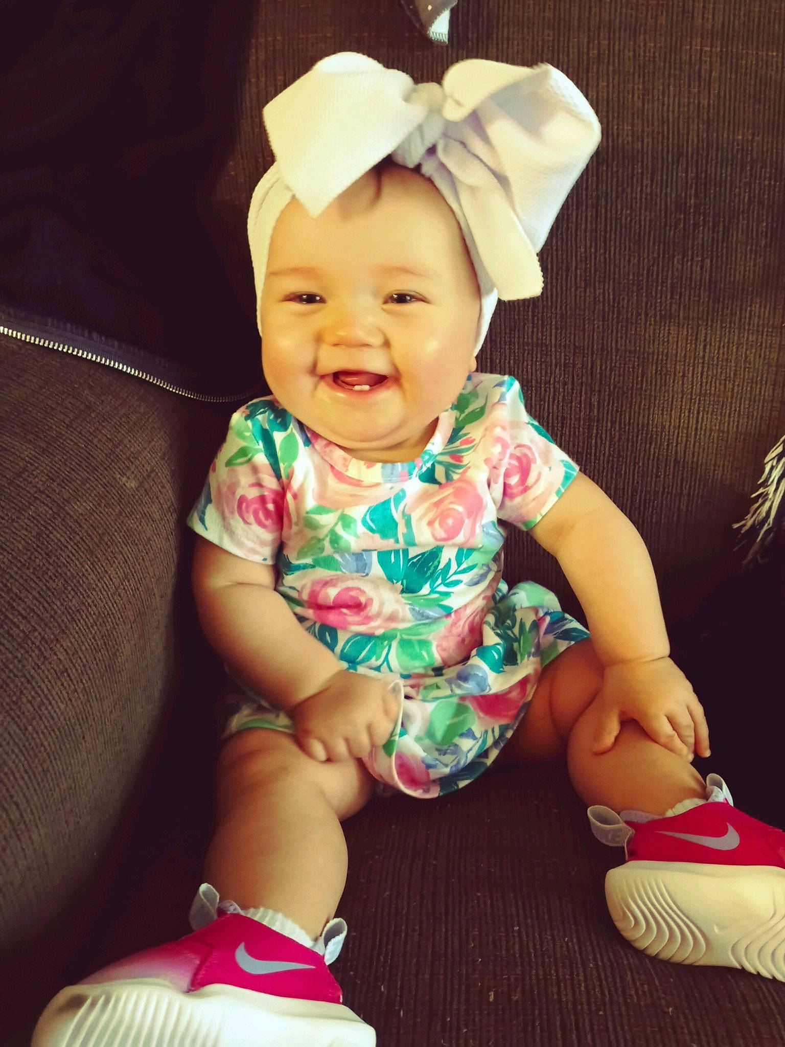 Aria joined the competition — help win amazing prizes! baby, baby_toddler_clothing, cap, child, dress, eye, fun, happy, hat, human_body, human_leg, joy, pattern, person, pink, sitting, skin, sleeve, smile, sock