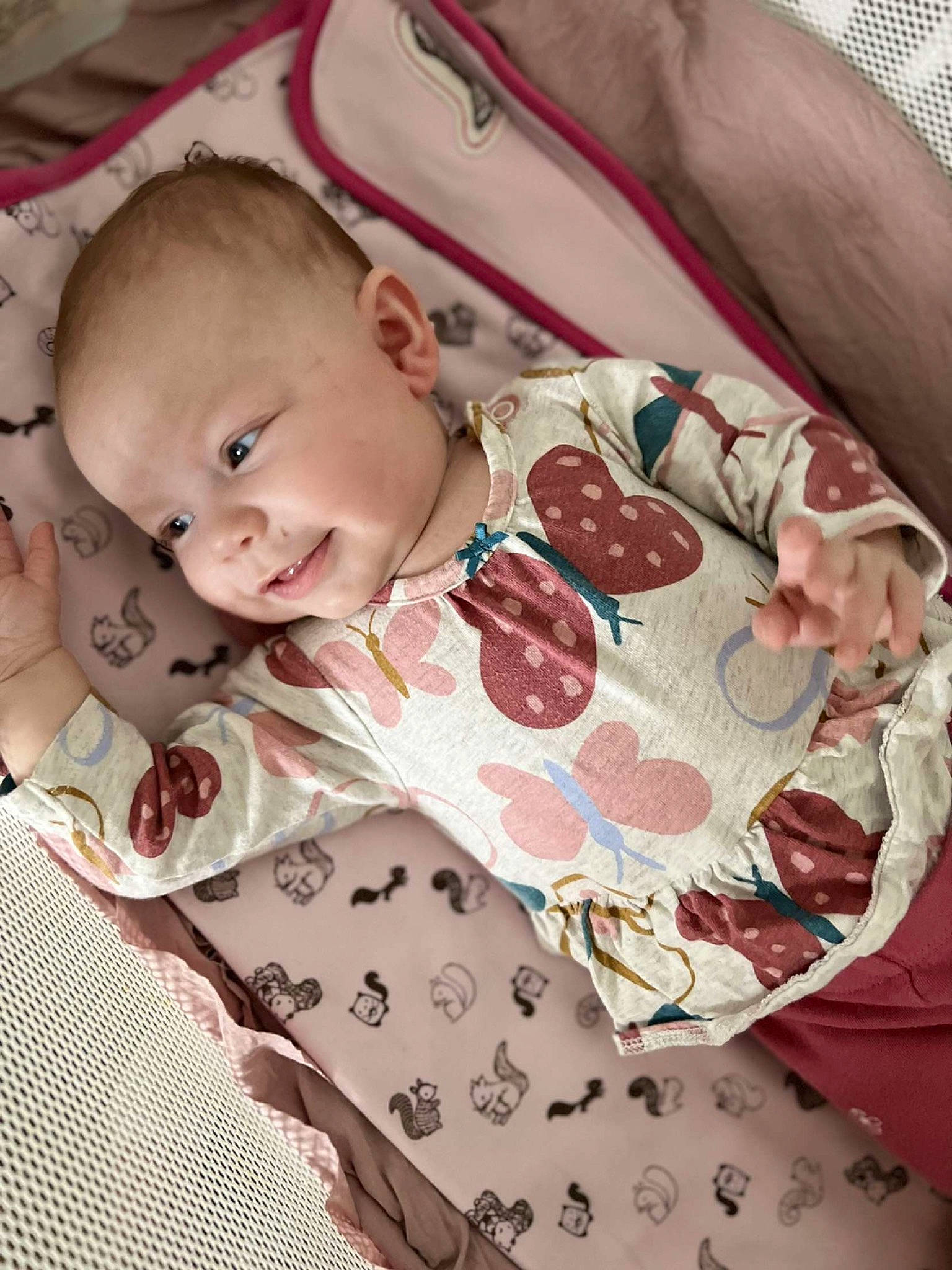 Jocelynn joined the competition — help win amazing prizes! baby, baby_products, baby_safety, baby_sleeping, baby_toddler_clothing, bedding, cheek, child, comfort, human_body, linens, pattern, person, pink, product, skin, sleeve, smile, textile, toddler