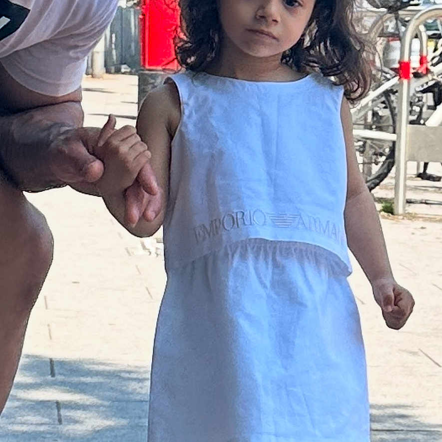 Marta joined the competition — help win amazing prizes! beard, bicycle, casual_clothing, child, curly_hair, daylight, girl, holding_hands, man, outdoor, person, public_space, red_mailbox, shoes, sidewalk, smiling, street, tree, urban, white_dress