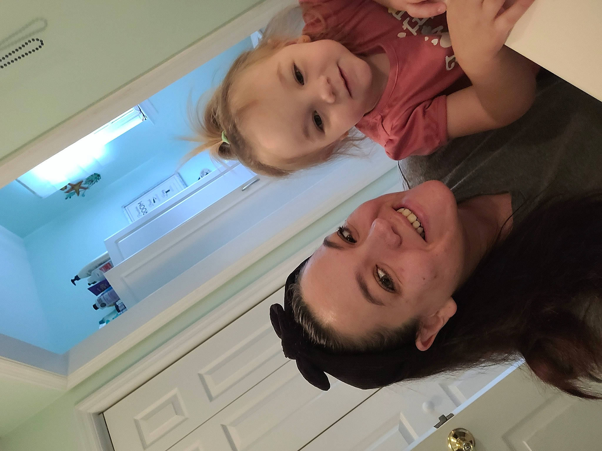 Ivey is registered to the contest to win money with this photo: baby, baby_toddler_clothing, child, comfort, display_device, event, eyelash, fun, hair, happy, home_appliance, joy, machine, mouth, person, room, service, skin, smile, toddler