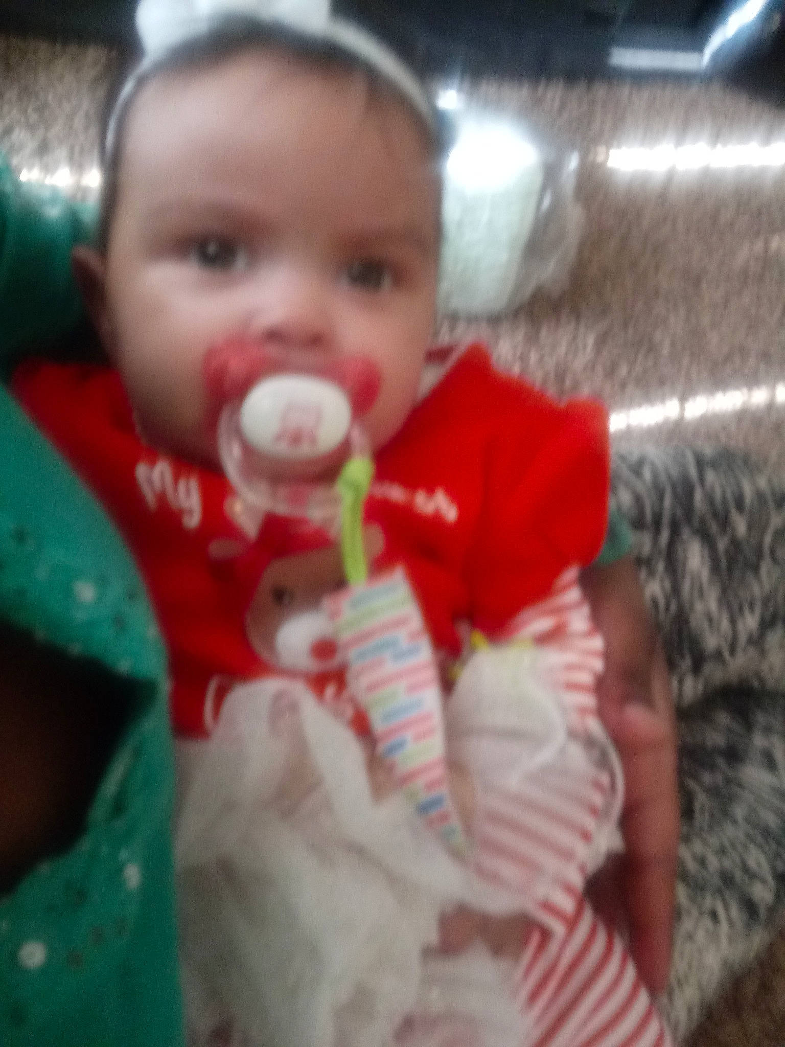 Charlene is registered to the contest to win money with this photo: cheek, child, day, eye, face, finger, fun, head, infant, iris, joy, lip, mouth, nose, person, play, product, skin, smile, textile