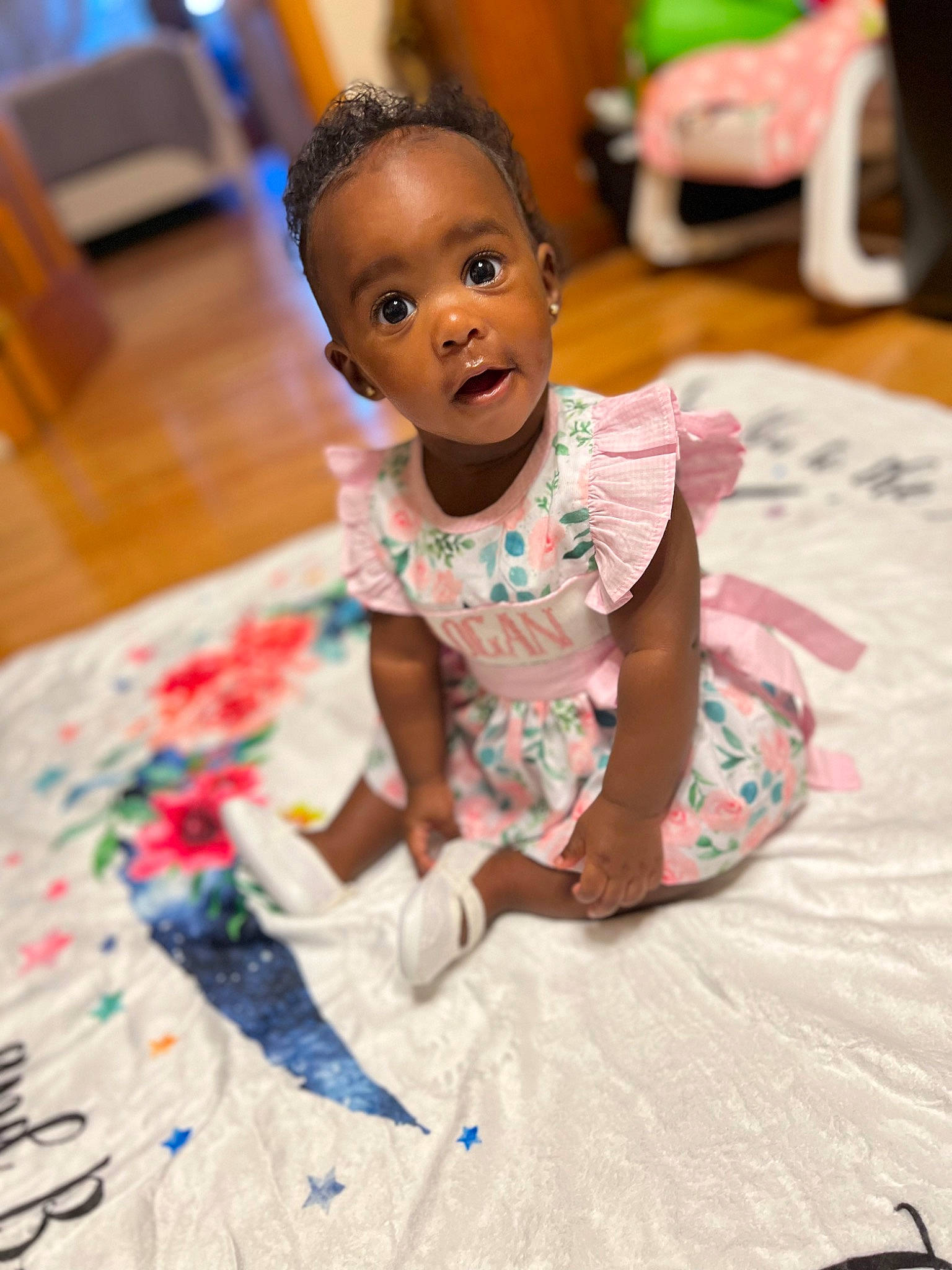 Logan joined the competition — help win amazing prizes! baby, baby_toddler_clothing, child, event, face, floor, flooring, fun, hair, happy, head, house, leisure, person, room, sitting, sleeve, smile, surprise, t_shirt