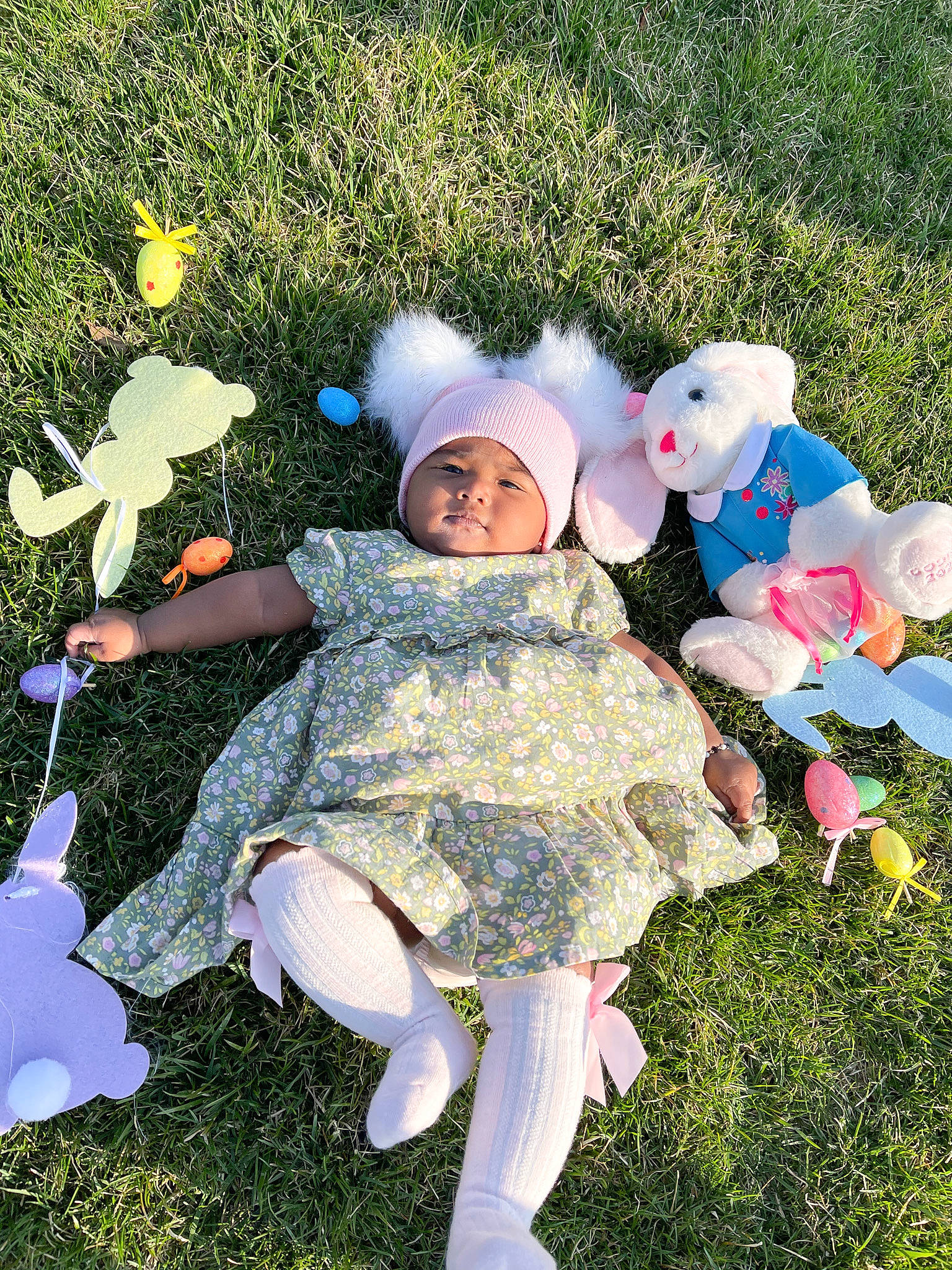 Kelsey is registered to the contest to win money with this photo: baby, baby_toddler_clothing, botany, costume_hat, event, fictional_character, fun, grass, happy, hat, headwear, lawn, leaf, people_in_nature, person, pink, plant, recreation, smile, toddler