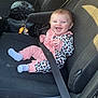 baby, child, car_seat, seatbelt, smile, happy, infant, clothing, pink, leopard_print, socks, interior, car, seat, person, cute, joy, portrait, sitting, safety