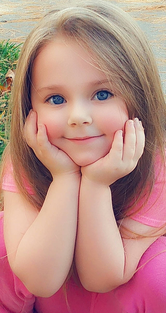 Arabella is registered to the contest to win money with this photo: beauty, blond, brown_hair, cheek, child, child_model, chin, close_up, eye, face, facial_expression, fun, hair, head, joy, lip, nose, person, pink, skin