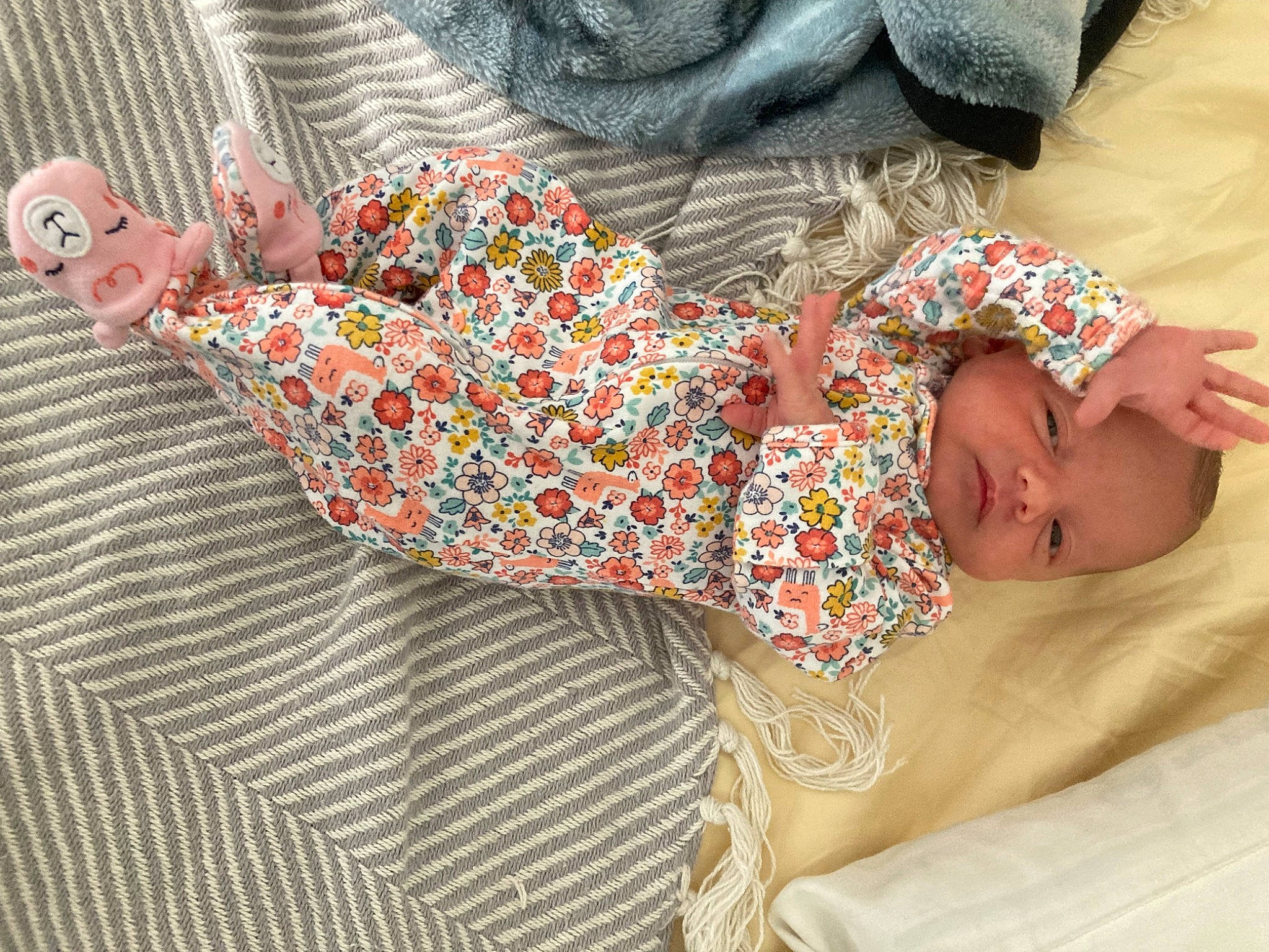 Viviana is registered to the contest to win money with this photo: baby_toddler_clothing, bed_sheet, bedding, bedroom, bedtime, child, comfort, couch, flooring, human_leg, leg, linens, mammal, nap, pattern, person, room, sitting, sleeve, textile