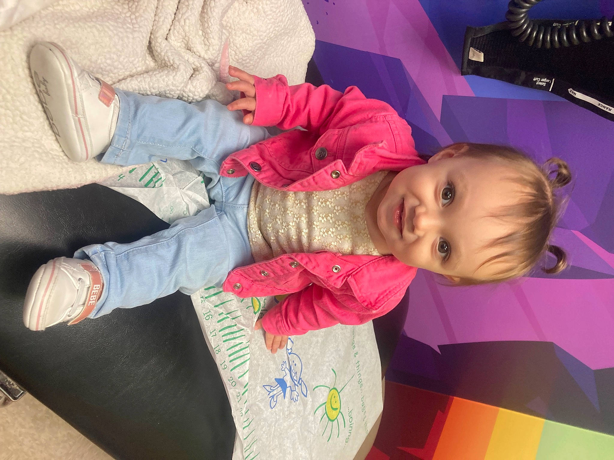 Gabriella joined the competition — help win amazing prizes! baby, baby_toddler_clothing, cheek, child, comfort, cool, facial_expression, finger, flooring, happy, human_body, human_leg, joy, lap, leg, leisure, nose, person, sitting, skin