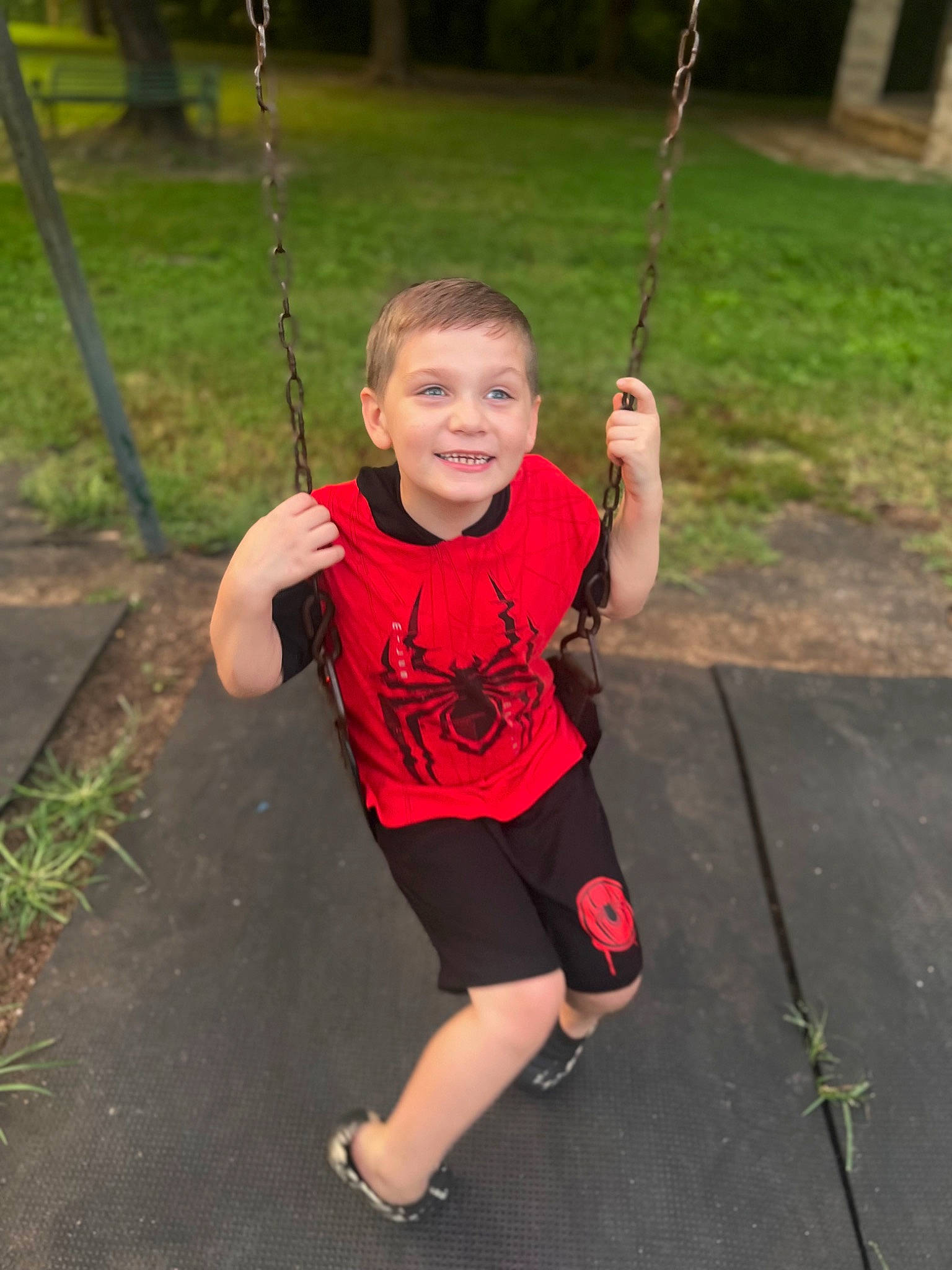 Camden joined the competition — help win amazing prizes! child, city, fun, grass, happy, human_settlement, joy, leaf, leg, leisure, outdoor_play_equipment, person, plant, playground, public_space, recreation, shorts, smile, swing, t_shirt