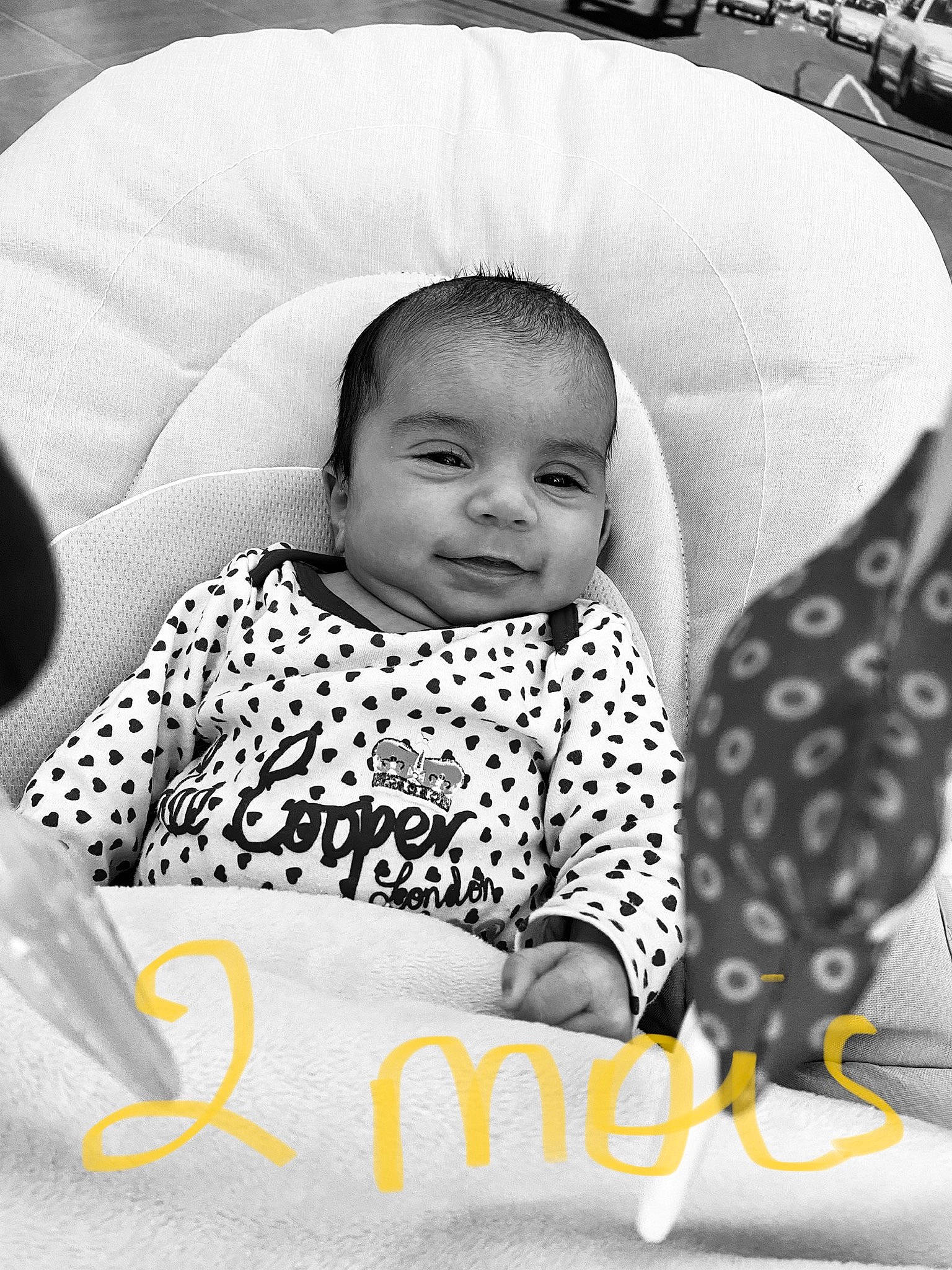 Julianna participe au concours pour gagner de l'argent avec cette photo : baby, baby_toddler_clothing, black, black_and_white, comfort, eyebrow, facial_expression, hairstyle, happy, human, iris, mammal, mouth, person, photograph, product, skin, smile, style, textile