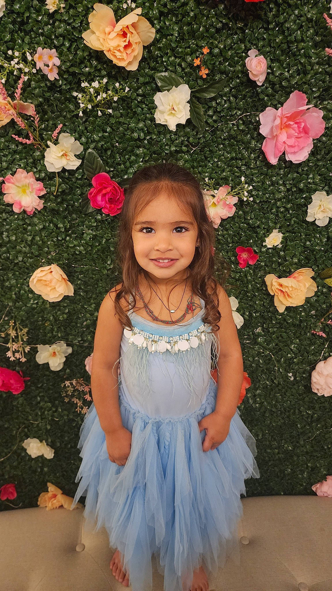 Sia joined the competition — help win amazing prizes! baby_toddler_clothing, beauty, dress, facial_expression, flower, flower_arranging, grass, happy, joy, magenta, pattern, people_in_nature, person, petal, pink, plant, skin, smile, summer, textile