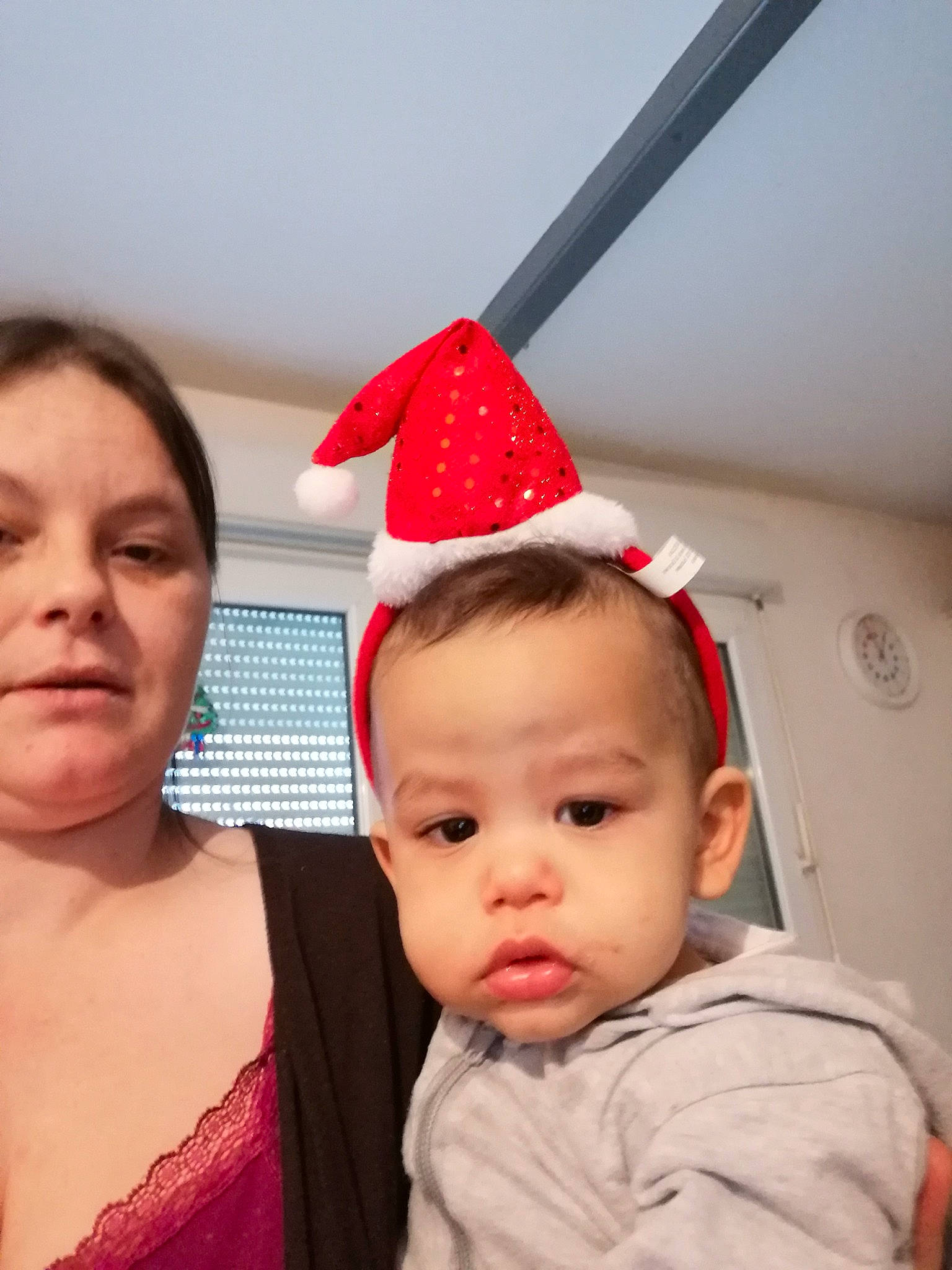 Zayan participe au concours pour gagner de l'argent avec cette photo : baby, baby_toddler_clothing, cap, child, christmas, cone, costume_hat, ear, event, face, fun, happy, head, headgear, holiday, lip, neck, outerwear, party_hat, person