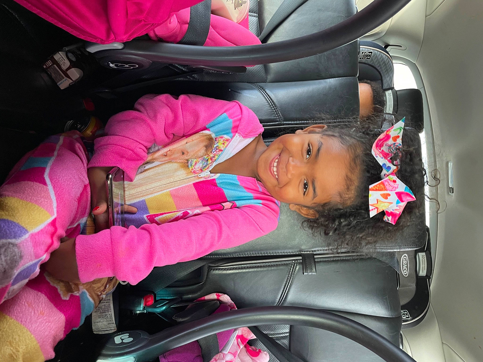 Zoë is registered to the contest to win money with this photo: baby_carriage, baby_in_car_seat, baby_products, baggage, car_seat, car_seat_cover, comfort, head_restraint, joy, lap, luxury_vehicle, magenta, passenger, person, pink, product, purple, seat_belt, toddler, vehicle_door
