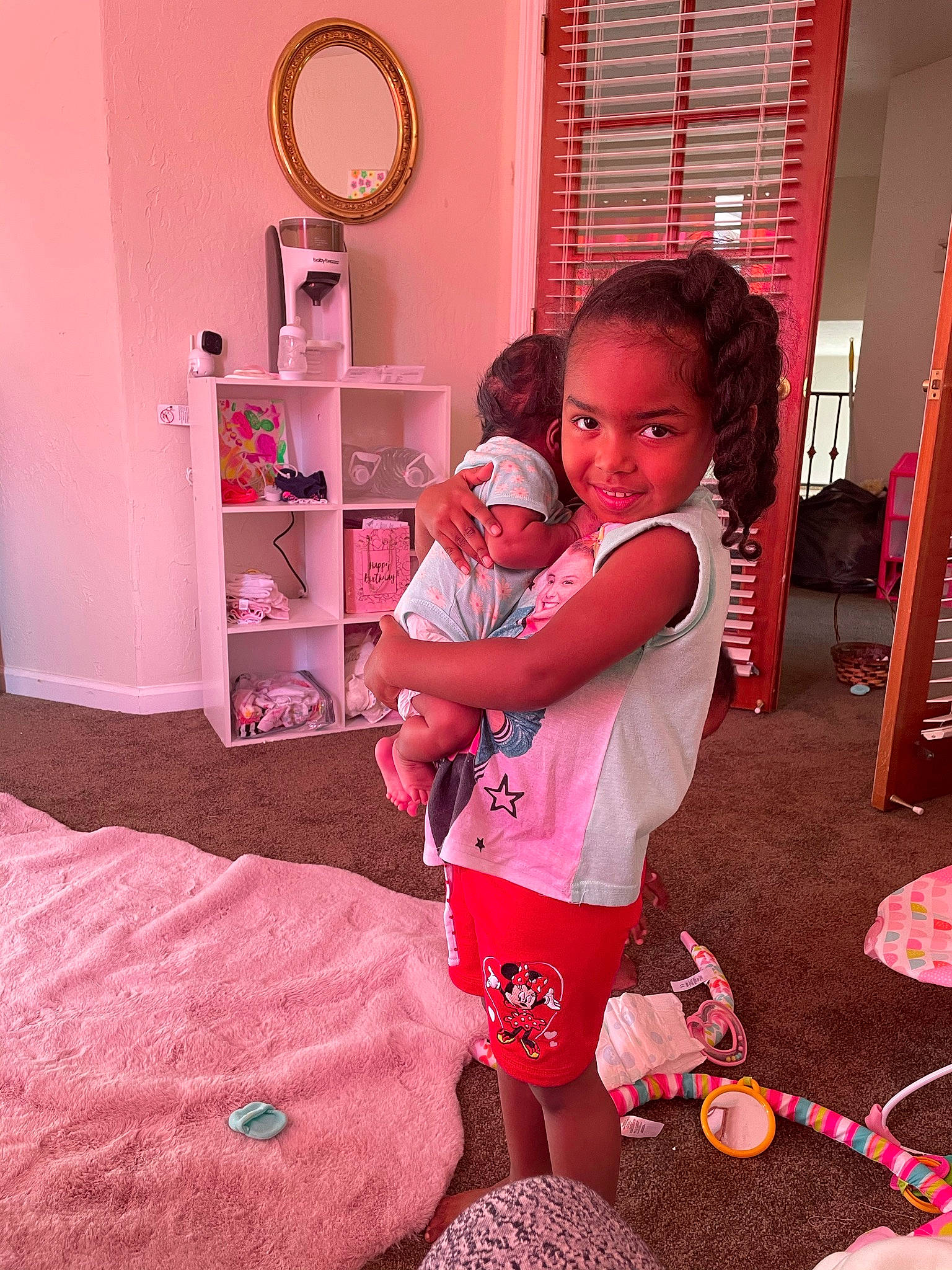 Zoë joined the competition — help win amazing prizes! baby, baby_products, baby_toddler_clothing, baby_toys, bed_sheet, bedroom, child, dollhouse, foot, joy, linens, nightwear, peach, person, pink, play, room, shelf, shelving, sock